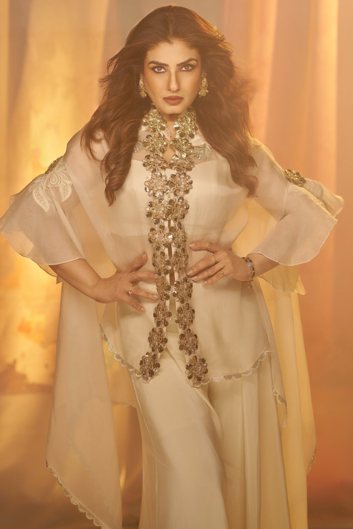 Raveena Tandon In Ivory Bloom Cape Set