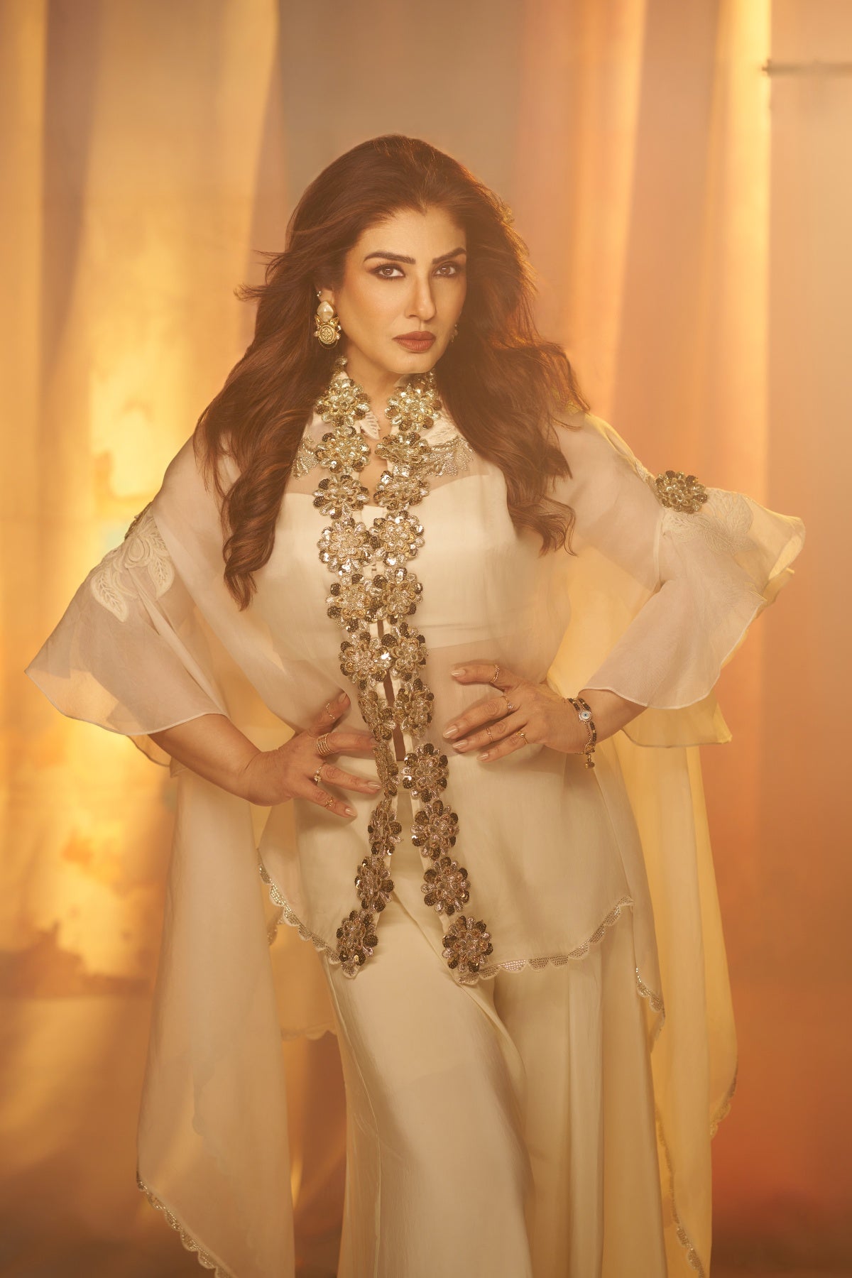 Raveena Tandon In Ivory Bloom Cape Set