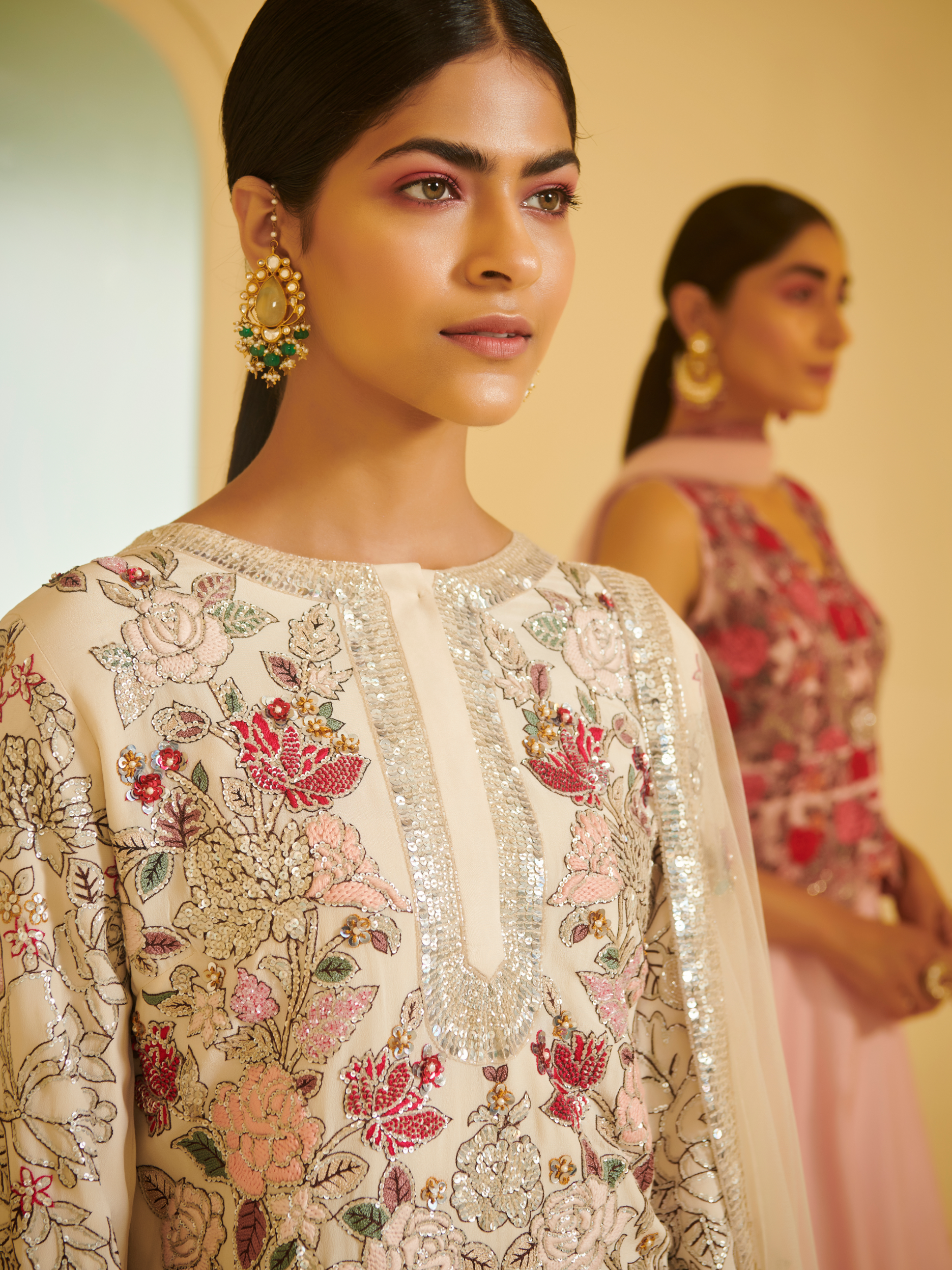 Ivory Embroidered Kurta Styled With Sharara And Dupatta