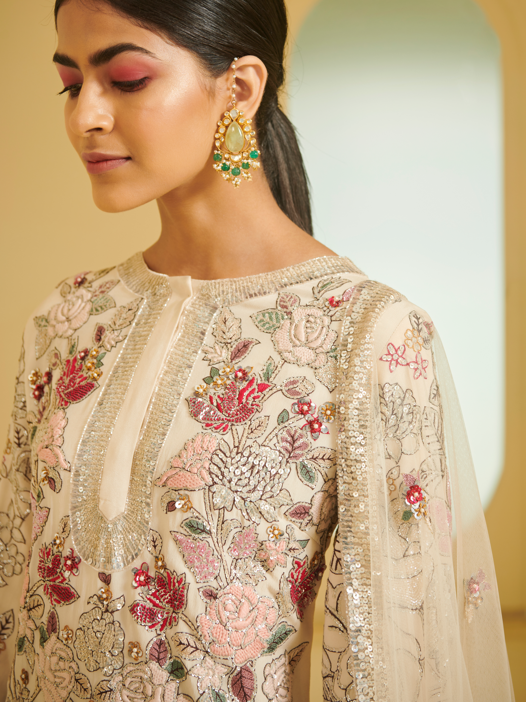 Ivory Embroidered Kurta Styled With Sharara And Dupatta