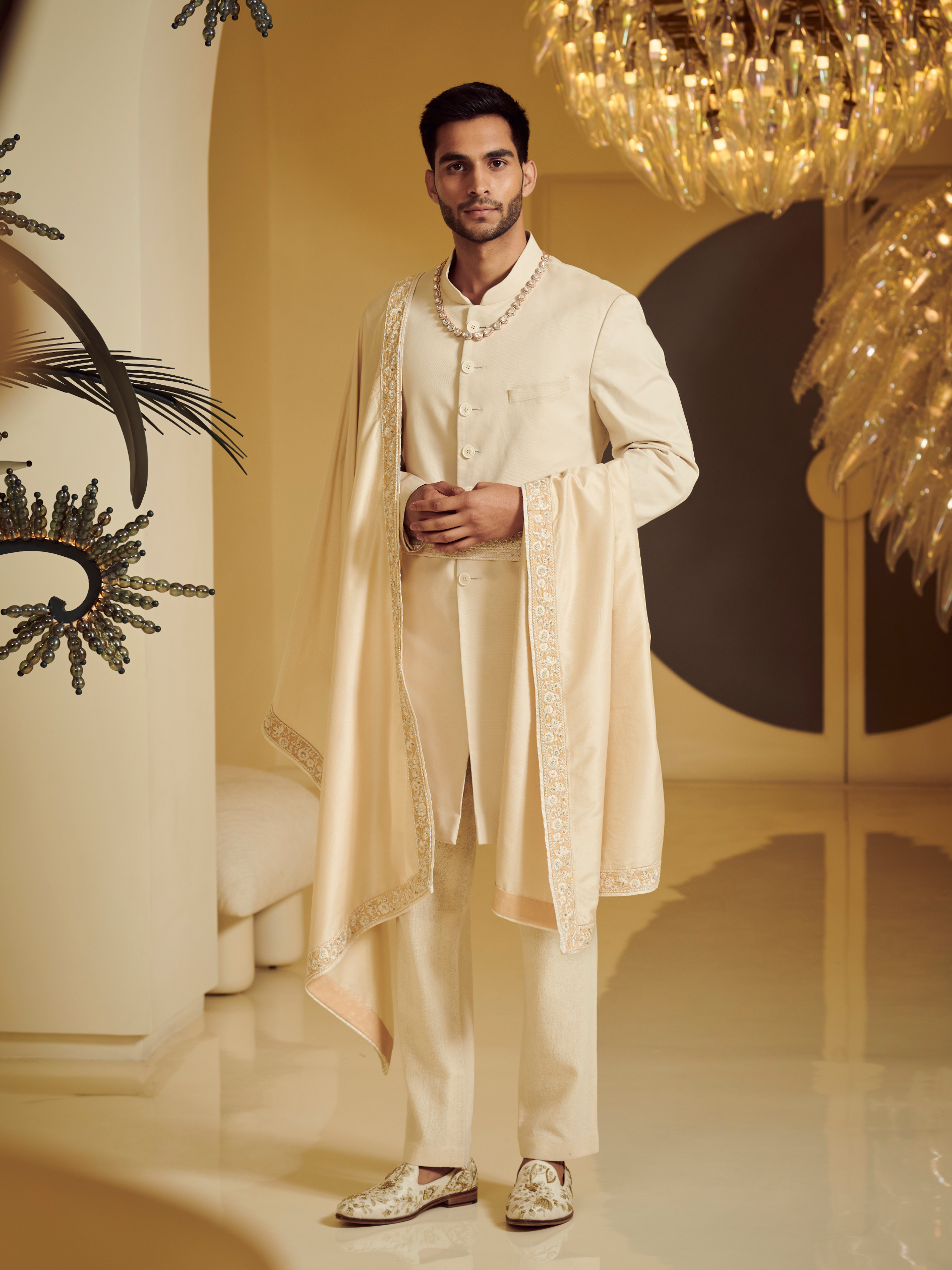 Ivory Sherwani Styled With Embroidered Belt, Kurta And Churidar