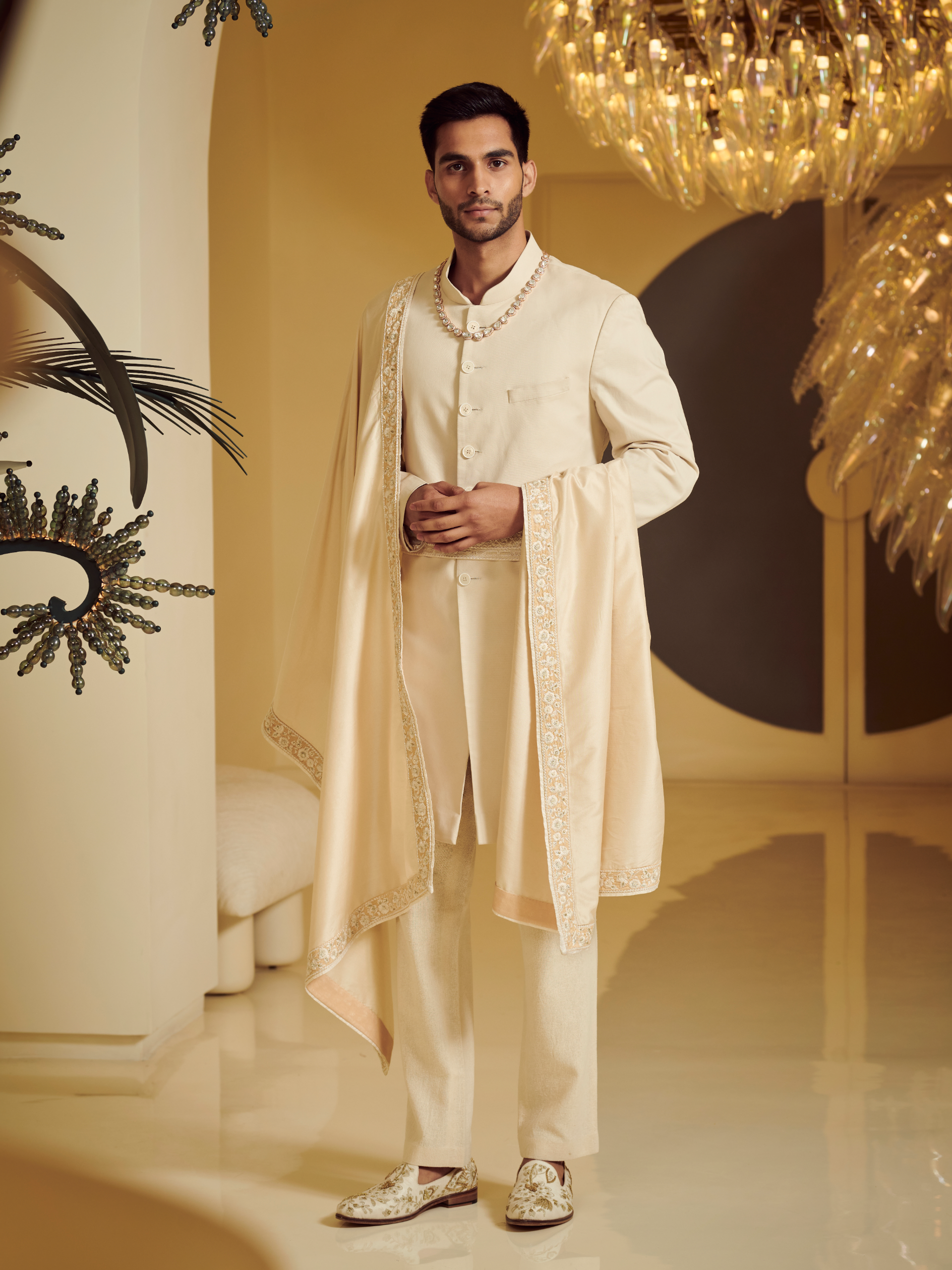 Ivory Sherwani Styled With Embroidered Belt Kurta And Churidar
