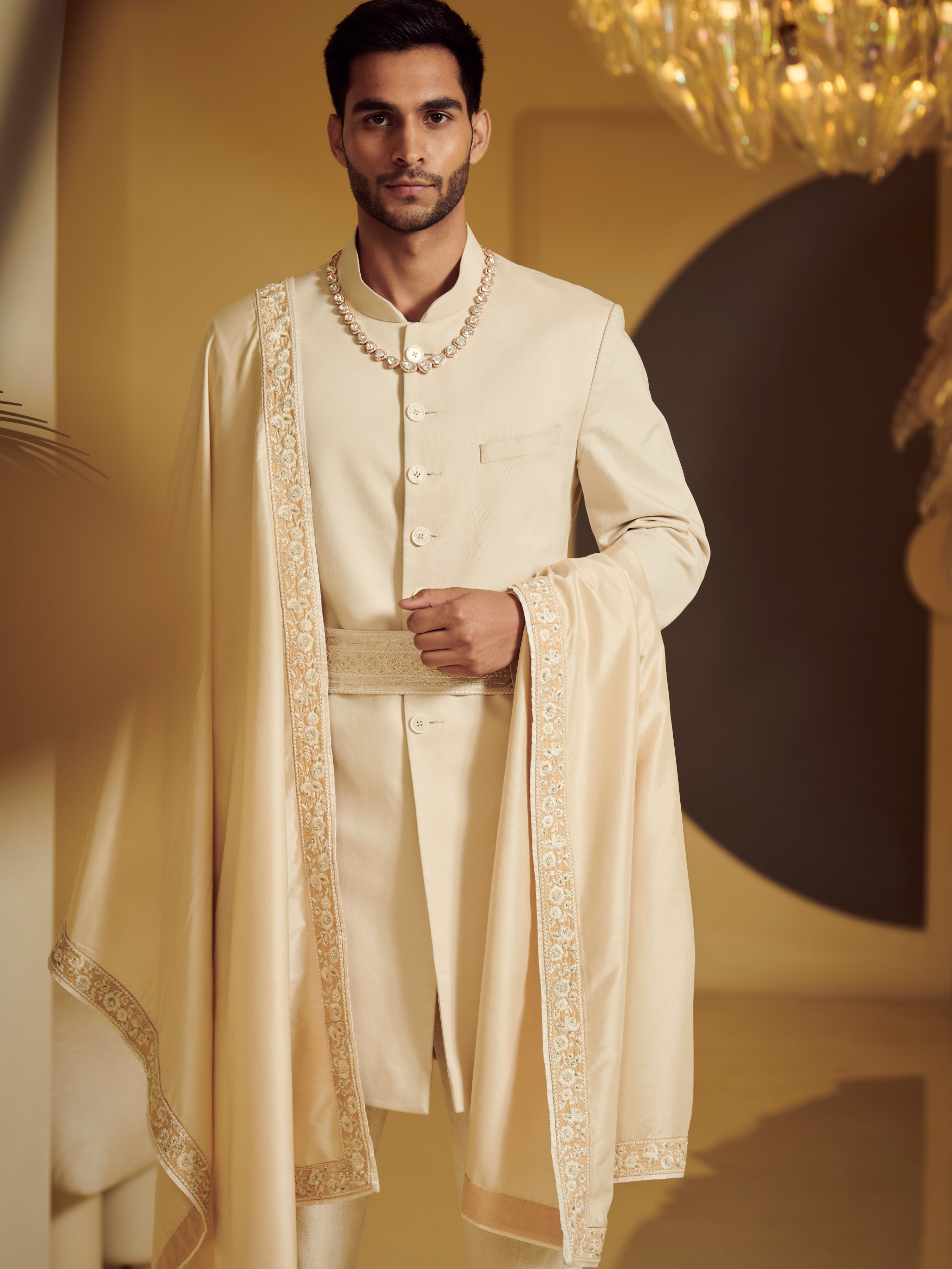 Ivory Sherwani Styled With Embroidered Belt, Kurta And Churidar