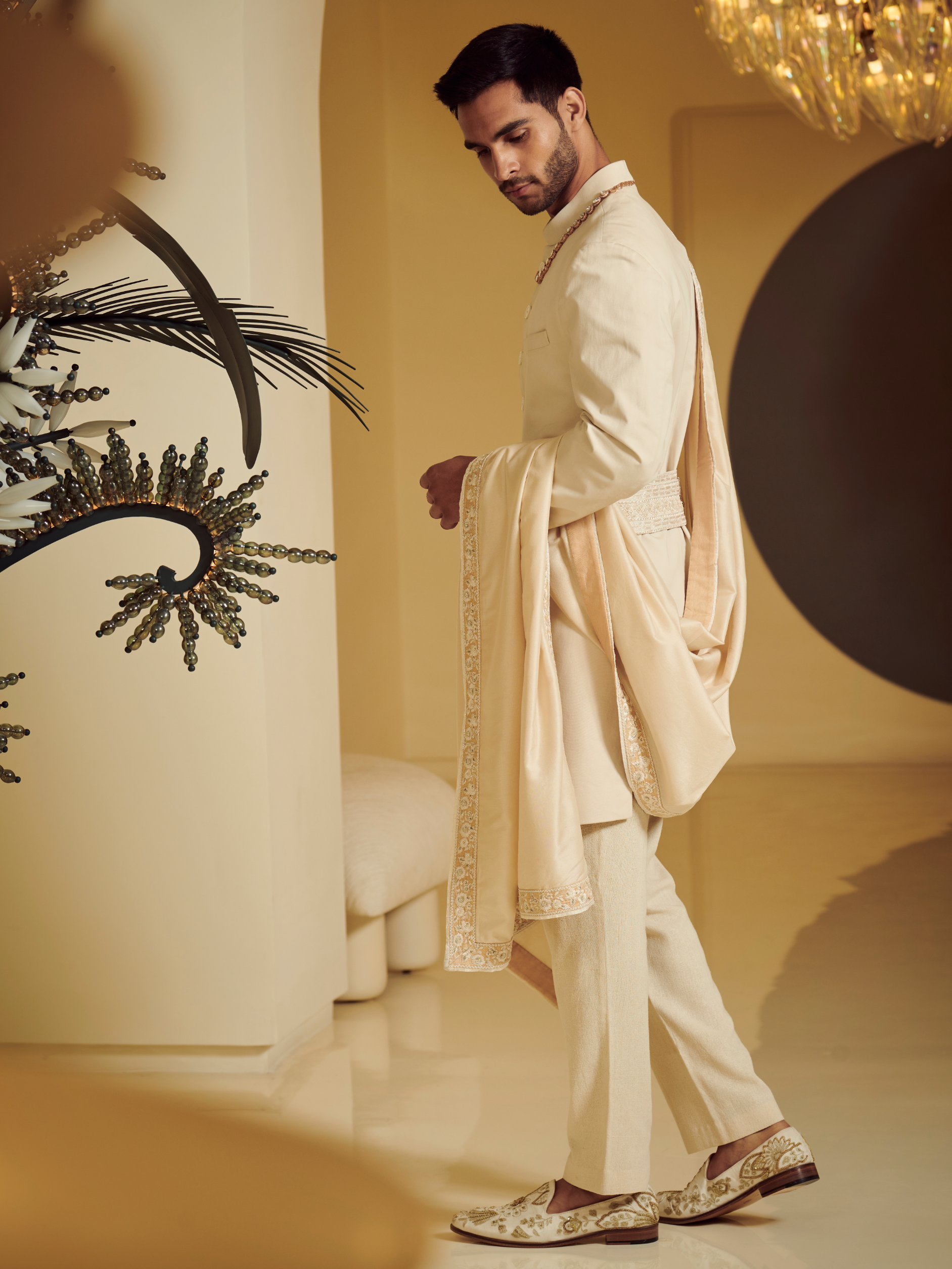 Ivory Sherwani Styled With Embroidered Belt, Kurta And Churidar