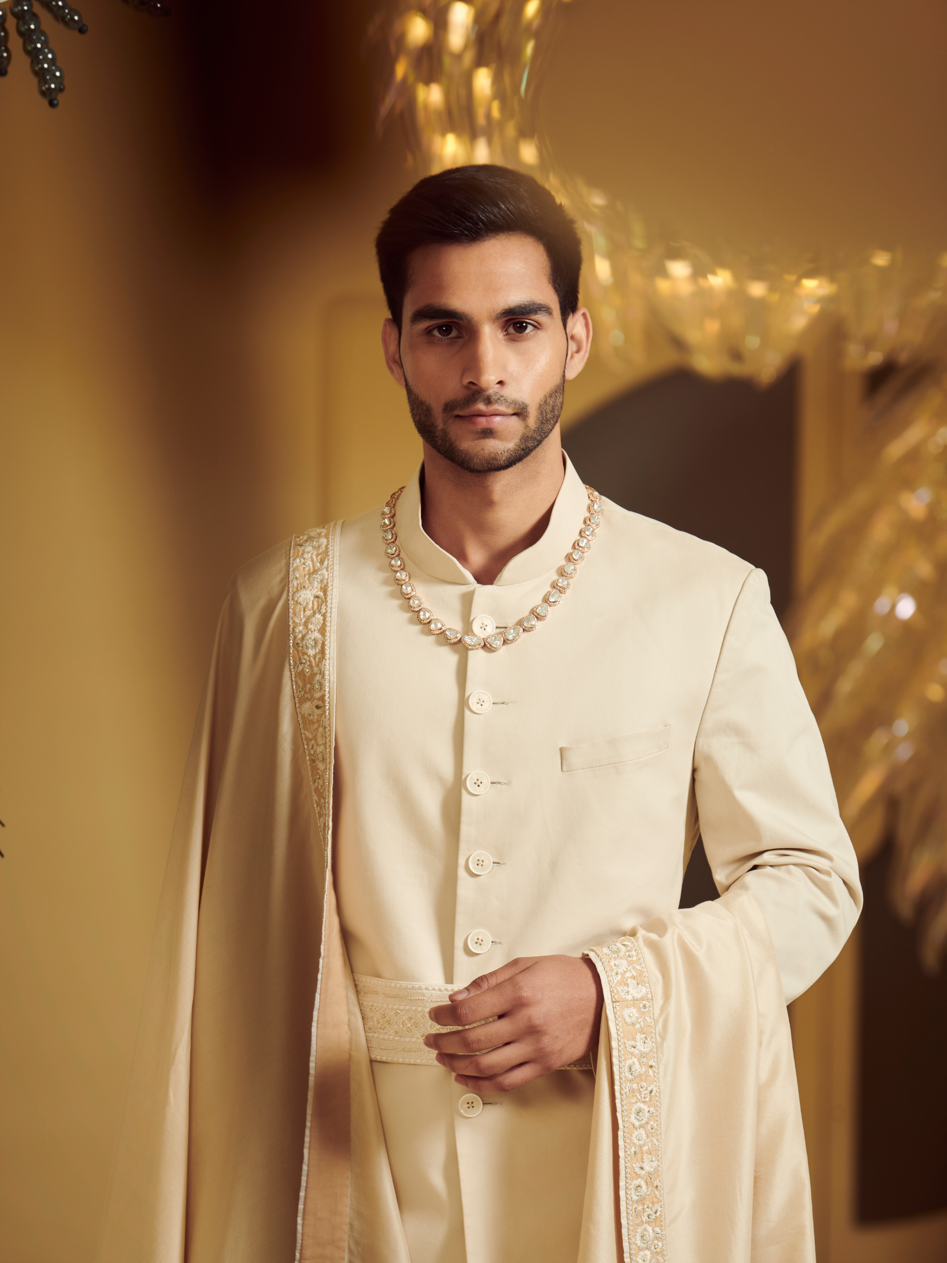 Ivory Sherwani Styled With Embroidered Belt, Kurta And Churidar