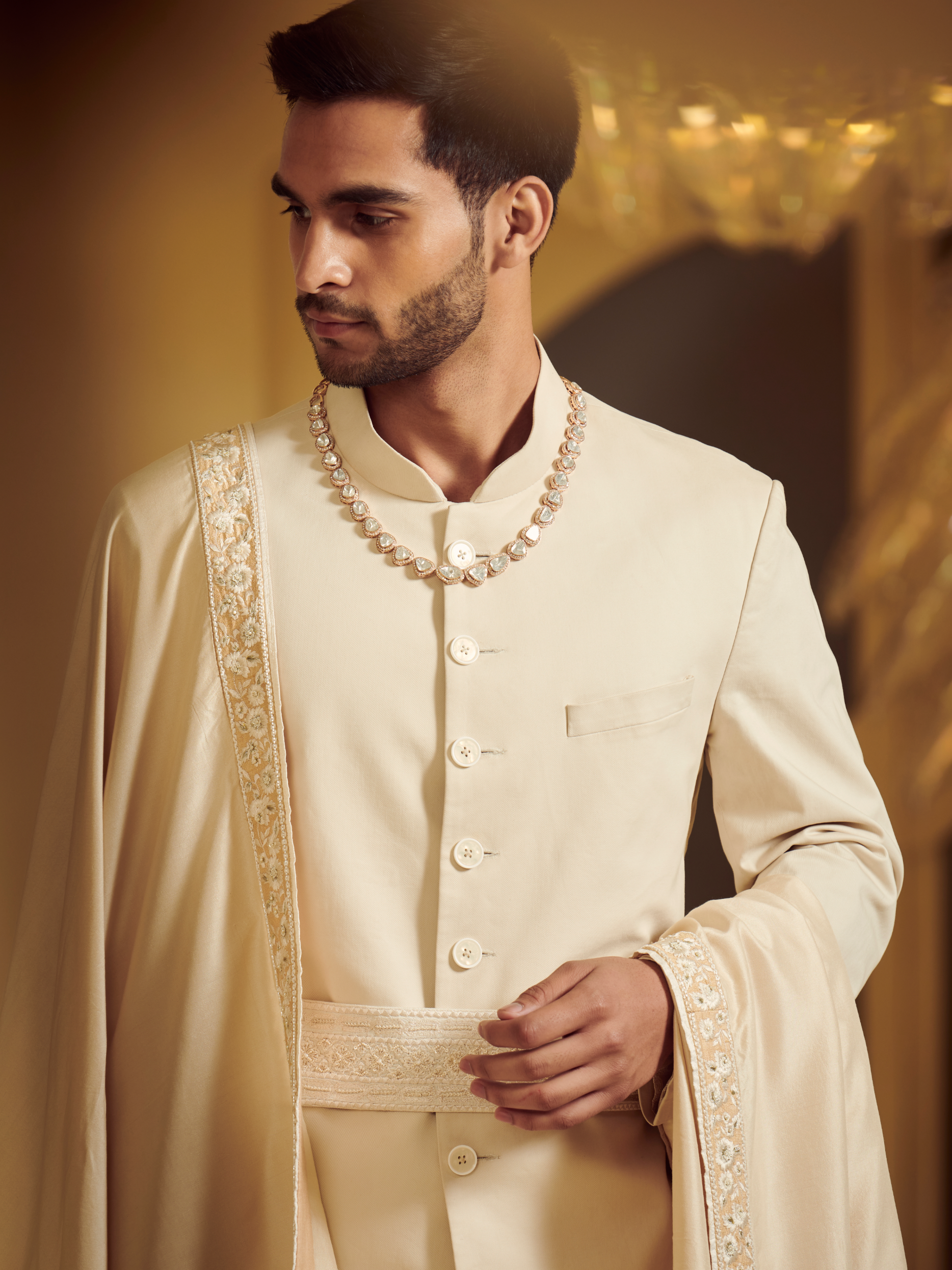 Ivory Sherwani Styled With Embroidered Belt, Kurta And Churidar