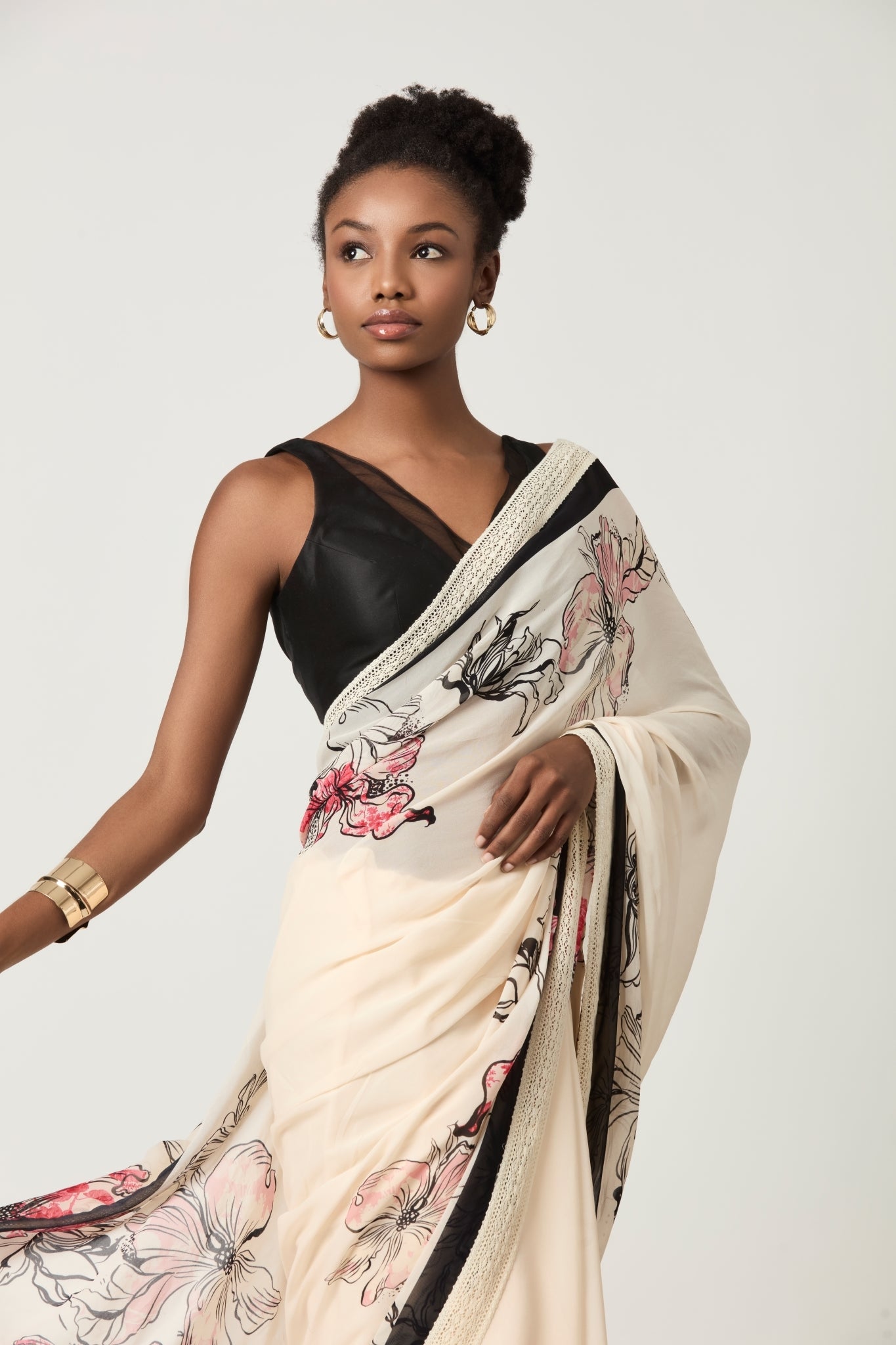 LUNA PLACEMENT PRINTED SAREE  WITH PLUNGING V-NECK BLOUSE